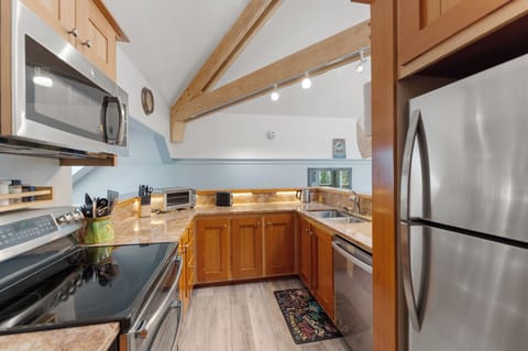 Full size kitchen with stainless steel appliances and lots of counter space
