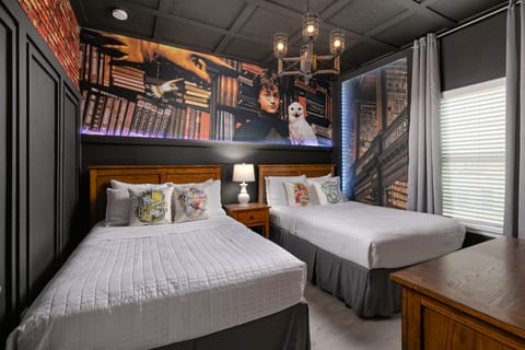 Harry Potter themed bedroom with two comfortable double beds