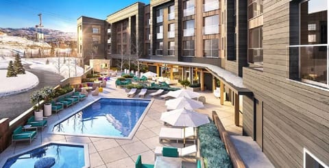 Pool deck and the view from the backside of the building -heated & open all year