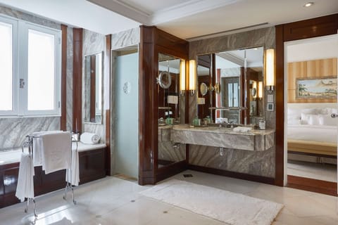 Penthouse, Partial Ocean View | Bathroom | Eco-friendly toiletries, hair dryer, bathrobes, slippers