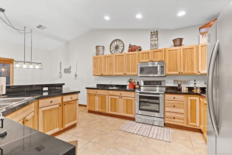 Fully stocked with everything from a Keurig to Crockpot!