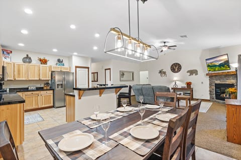 Open concept with a large kitchen & wrap around eating bar. 