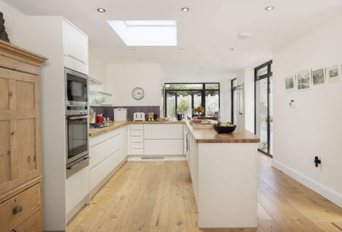 Ground floor: Open-plan living space with well-equipped kitchen