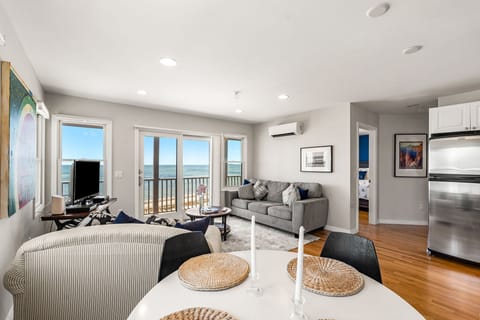 Living room with Cape Cod Bay views