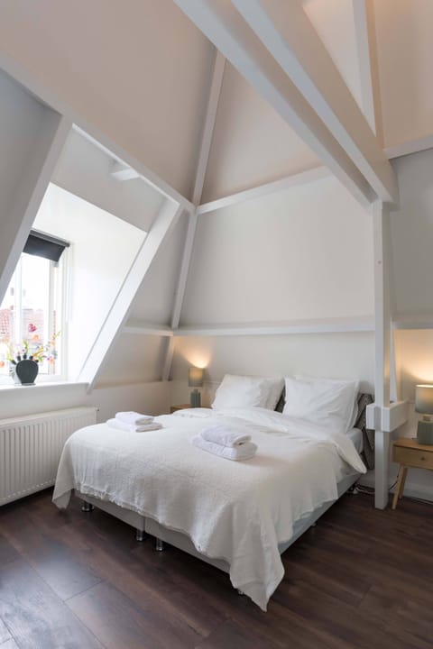 Comfy double bed in the first bedroom 