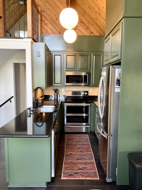 Beautiful kitchen, new appliances and refinished cabinets - ready for baking.