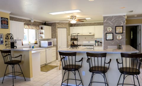 Upstairs full kitchen and bar area