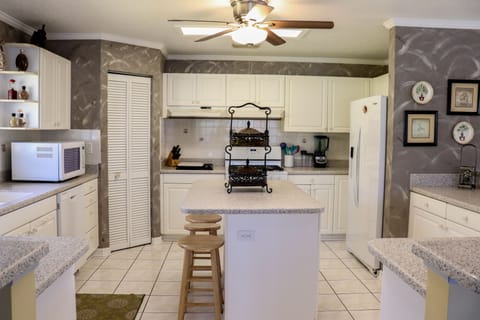 Upstairs kitchen and large island area