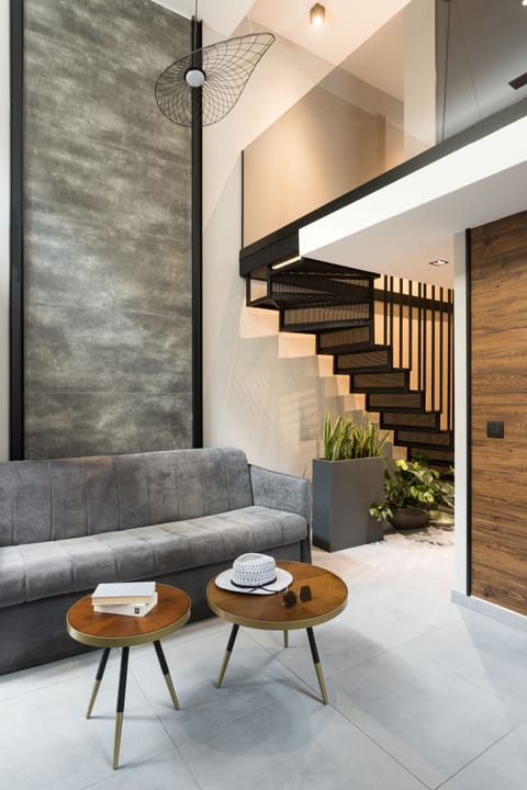 Grand Suite, 2 Bedrooms | Living area | LED TV, printers