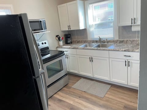 Full kitchen has all utensils, pans and linens.  With spices and seasonings.