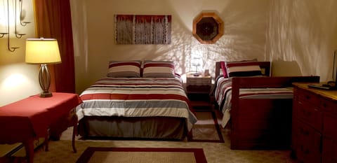 Master Bedroom, queen bed, twin bed, folding tale for light meals social games/