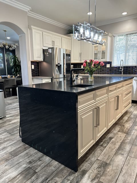 Large quartz island with prep sink