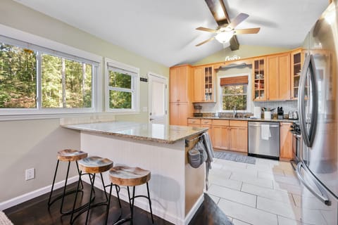 main floor kitchen and bar (seats 3)