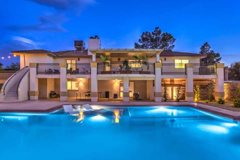 Outdoor Oasis: Dive into relaxation by the shimmering saltwater pool under twinkling stars!