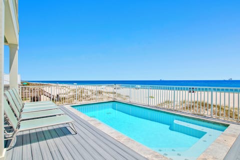 Featuring a private, heated pool overlooking the Gulf