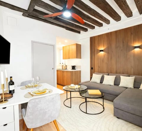 Cosy living room with large convertible sofa bed, perfect for watching TV