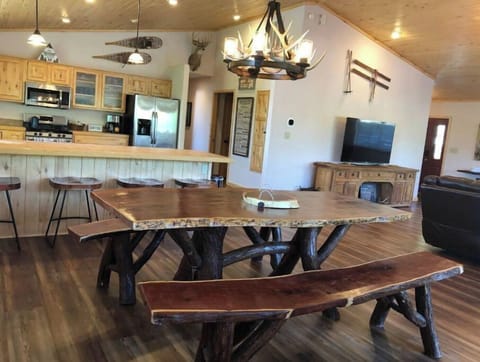 View from dining into kitchen and living