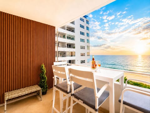 Ocean Manor rooftop terrace—dine al fresco with panoramic sunset views.