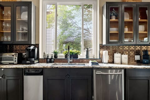 Bright, well-equipped kitchen with tons of natural light. 