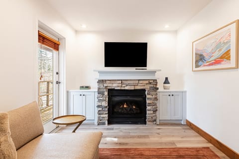Gas fireplace and smart TV in living room