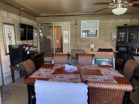 Sunroom is great for entertainment. Unwind  watching tv or play games