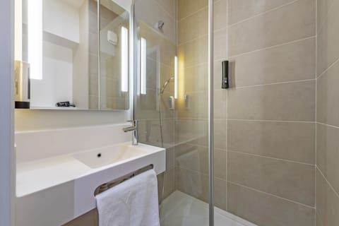 Shower, towels, soap, shampoo