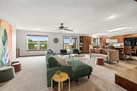 This open concept space is covered in windows, allowing ample amounts of natural light to shine through!