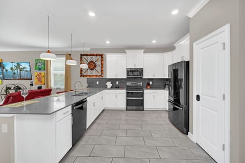 kitchen: cooking utensils, dishware, cookware, cleaning supplies