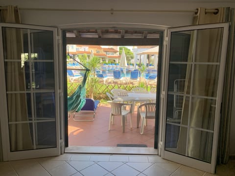 View to the ground terrace with pool access