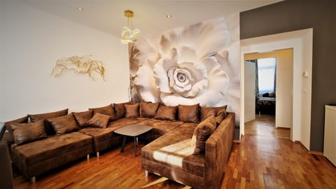 Luxury Apartment | Living area | 75-inch Smart TV with satellite channels, TV, Netflix