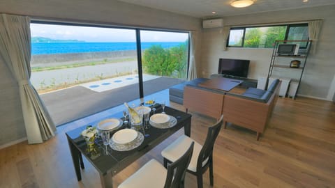 Premium Villa (1F) | Living area | Flat-screen TV