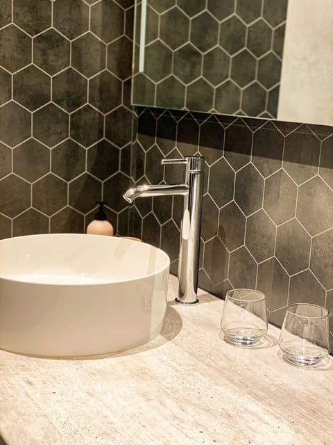 Panoramic Double Room | Bathroom | Shower, rainfall showerhead, hair dryer, heated floors