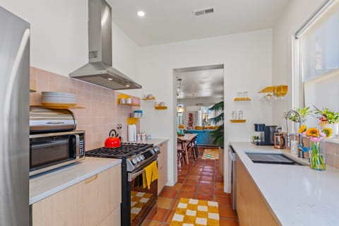 Kitchen looking into dining/living