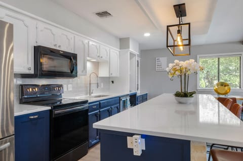 The huge island is large enough for your biggest meals with family and friends.