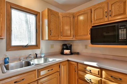 Dishes, pots, pans and utensils. Plus coffee maker, toaster and microwave.