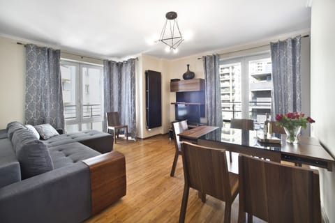 Deluxe Apartment | Living room | TV