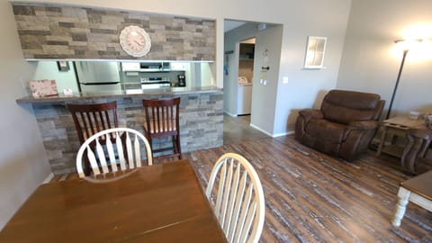 View of Entryway & Kitchen from the Living Room