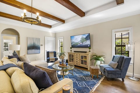 This home will not bore you! Aside from its relaxing ambiance, it also comes with books, a 65-inch television with soundbar speakers, and lightning-fast WiFi.