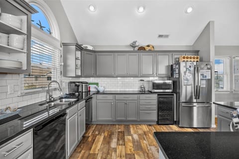 Kitchen - Modern designs and stainless appliances make this kitchen an entertainer's dream.
