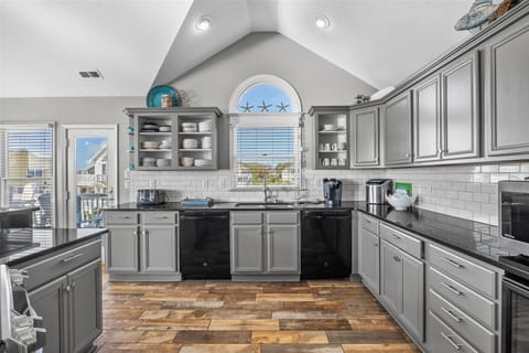 Kitchen - Modern designs and stainless appliances make this kitchen an entertainer's dream.