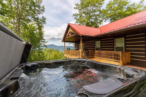 Soak in the hot tub while sweeping mountain views stretch out before you. Pure Blue Ridge relaxation at Firefly Cabin.