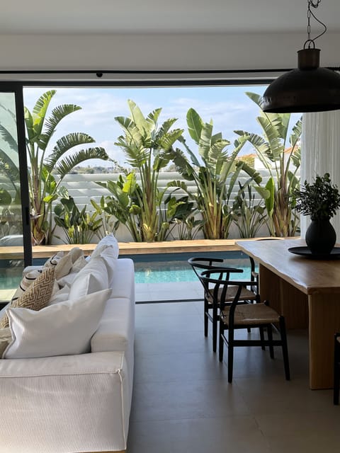 Villa | Living area | 43-inch TV with cable channels