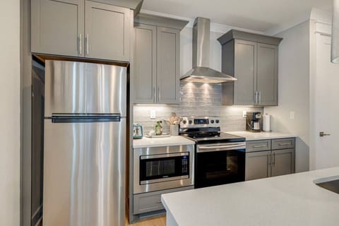 Kitchen with plenty of pots, pans, and utensils