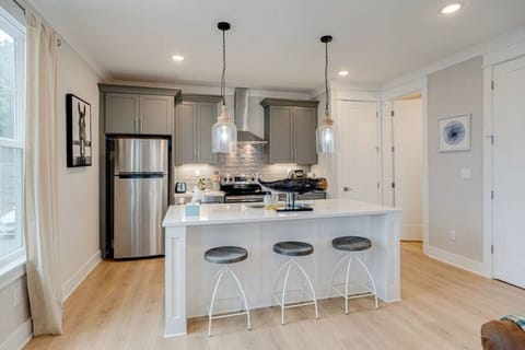 Full kitchen with island and pantry