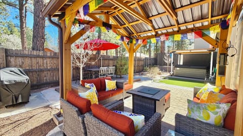 Outdoor Gazebo, fire pit, hot tub, and dining deck.