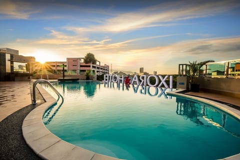 Outdoor pool, open 7:00 AM to 9:00 PM, sun loungers