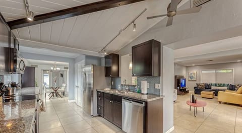 MAIN HOUSE KITCHEN #1- Fully Appointed Updated Kitchen with Stainless Steal Appliances (Microwave, Refrigerator, Ceramic Cooktop & Oven, Dishwasher, Toaster, Regular Drip Coffee Maker & Fully Stocked with Pots/Pans, Baking Pans, Dishware, Silverware & Glassware.