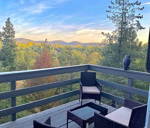 Morning coffee with a view 🍃☕️ Surrounded by trees, peace, and golden mountain light — nature at its finest.