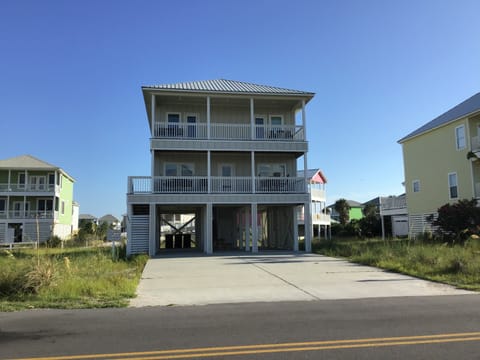 Front of House - Fitz Us Fine sits across the street from one of several beach access boardwalks.
