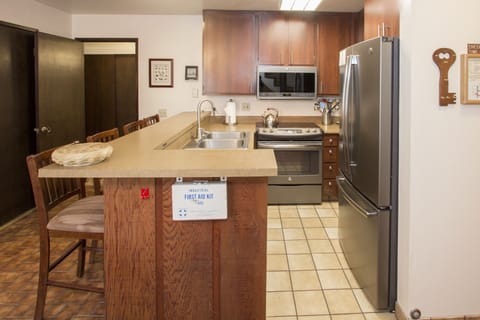 Room, Indoors, Refrigerator, Flooring, Chair